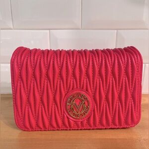 New WT Orlandi Valentino crossbody/clutch. Perfect for on the go. Perfect gift